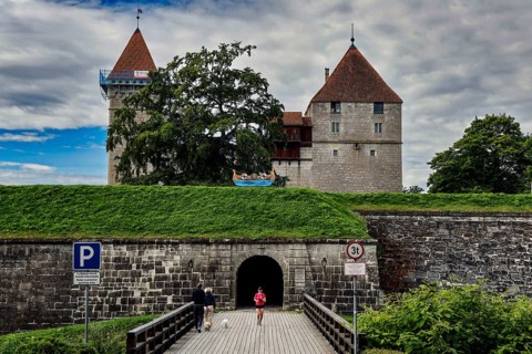 Impressive medieval castle complex with towers and entrance through a stone wall, Kuressaare,