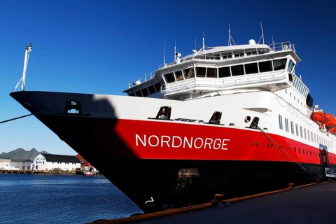 The Hurtigruten ship Nordnorge at Svolvær harbour under a clear blue sky, Svolvær, Nordland, Norway