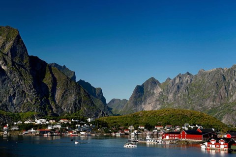 Reine on the coast with picturesque mountains and clear waters of Lofoten, Reine, Moskenesøy,