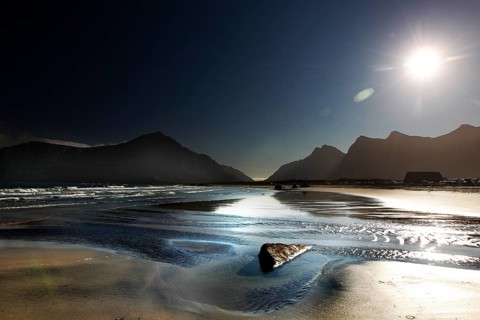 Sunny beach on Flakstadøy with mountains in the background, Flakstad, Lofoten, Norway