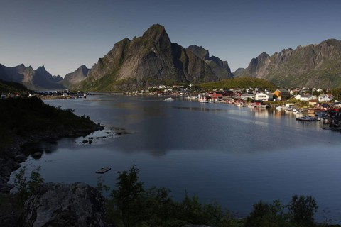 View of Reine and Hamnøay with water and impressive mountain scenery of Lofoten, Reine, Moskenesøy,