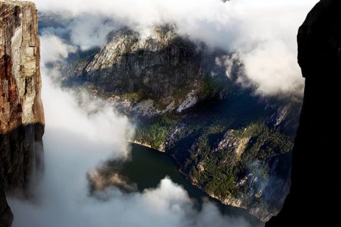 Breathtaking view of Lysefjord through clouds and between steep rocks, Lysefjord, Norway