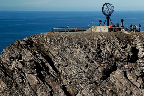 Panorama of cliffs at the North Cape with the globe and sea in the background, North Cape,