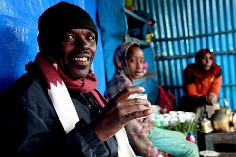 Man in Rira at a coffee ceremony in the Bale Mountains, convivial atmosphere, Rira, Bale Mountains,
