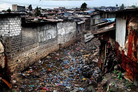 Dilapidated street full of trash and abandoned buildings in the Mercato of Addis Ababa, Addis