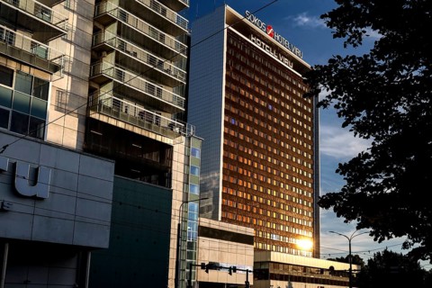 Tall modern hotel building in central Tallinn in the evening sun, Tallinn, Harju, Estonia