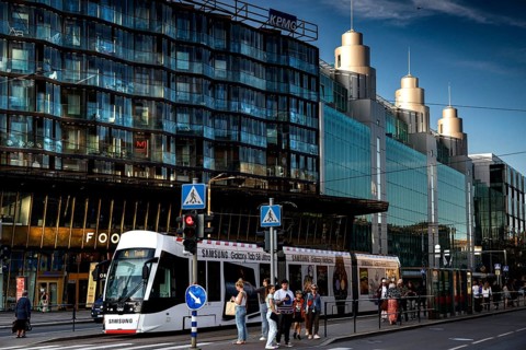 Modern glass architecture in Tallinn city center on Narva Maantee with tram traffic, Tallinn,