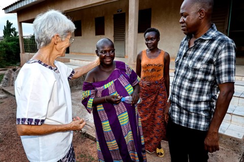 Staff and patients at CI Korhogo talking outdoors, Korhogo, CI, Côte d'Ivoire