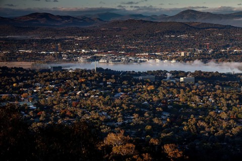 Panoramic view from Mount Ainslie of Canberra's western suburbs and countryside at dusk, Canberra,