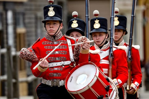 Soldiers in historic red uniforms with a drum in Sovereign Hill, Ballarat, Ballarat, Victoria,