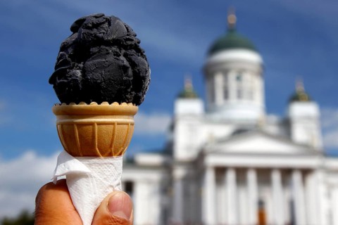 Salmiak ice cream in front of Helsinki Cathedral on Senaatintori Square, Helsinki, Finland, Finland