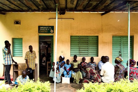 A group of people waiting in a hospital waiting room, old architecture, Bouake, null, Côte d'Ivoire