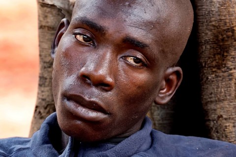 Close-up of an exhausted man outdoors in Bouaké. He seems emotionally burdened, Bouaké, Saint