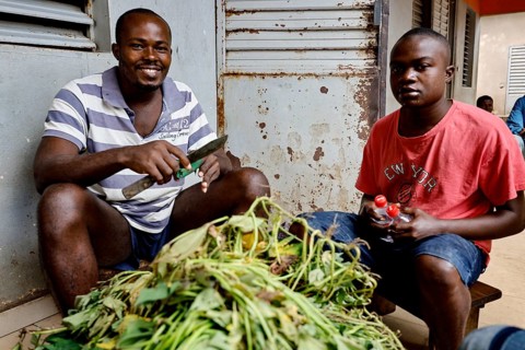 Men work together in the kitchen of Saint Camille men's psychiatry, Bouaké, Côte d'Ivoire