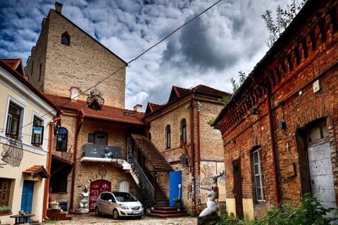 Courtyard view with old brick building and art studio in Vilnius' Užupis district, Vilnius, Užupis,
