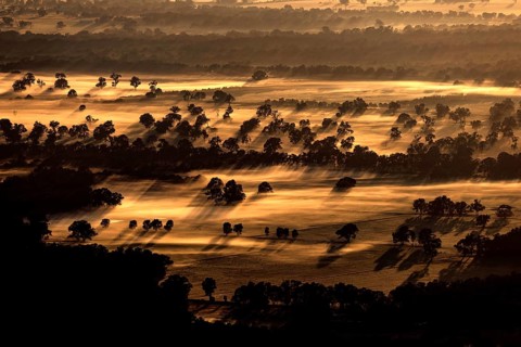 Evening landscape view of Boroka Lookout in the Grampian Mountains with illuminated fields and