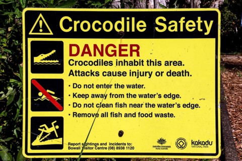 Crocodile safety warning sign in Kakadu National Park, Kakadu National Park, Northern Territory,