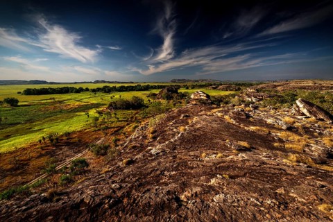 Rugged landscape under dramatic skies from Nardab Lookout in Ubirr, Kakadu National Park, Ubirr,