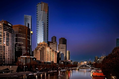 Illuminated Melbourne skyline on Yarra River at night, Melbourne, Victoria, Australia