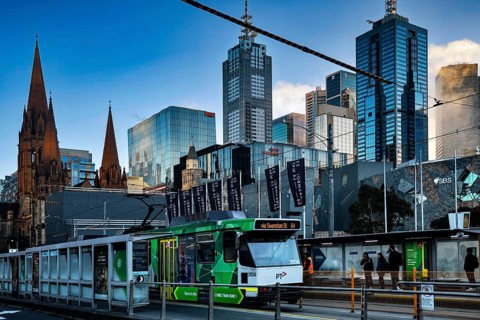 Modern skyscrapers and streetcar next to Federation Square in Melbourne, Melbourne, Victoria,
