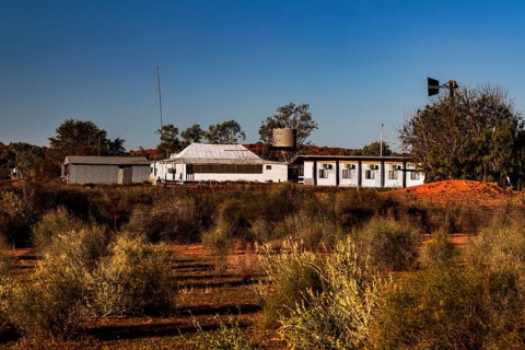 Old Andado Station building surrounded by desert vegetation in the Australian Outback, Old Andado