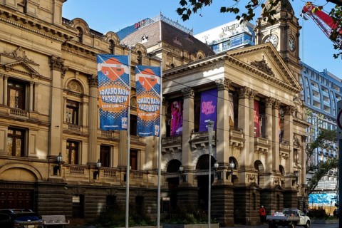 Historic Town Hall on Swanston Street in Melbourne with decorative posters, Melbourne, Victoria,