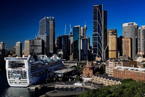 View of Sydney skyline with a large cruise ship in the foreground, Sydney, New South Wales,