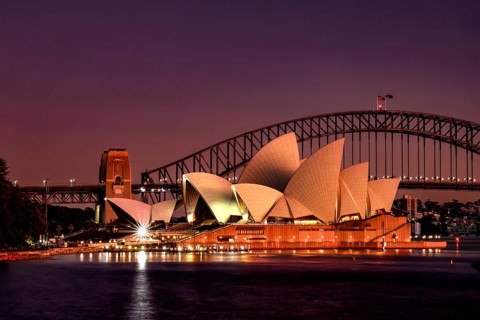 Sydney Opera House and Harbour Bridge at dusk with lights, Sydney, New South Wales, Australia