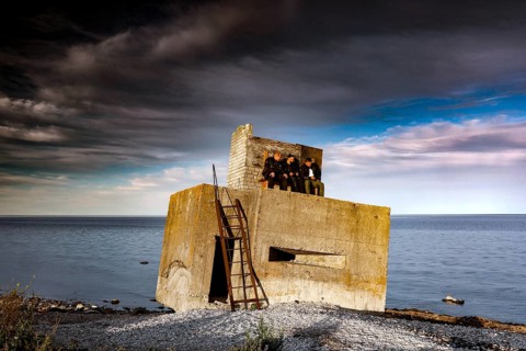 Abandoned bunker on a stormy coast with dramatic clouds, Sääre, Saaremaa, Estonia