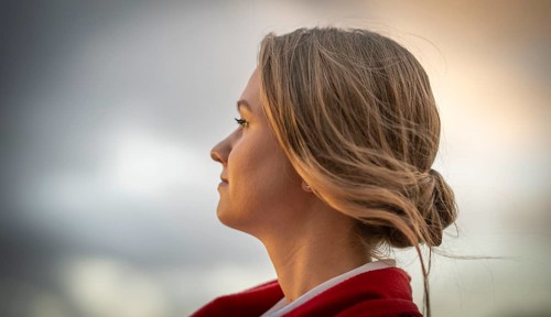 The face of a young woman in profile, in the evening light, Stuttgart, Baden-Württemberg, Germany