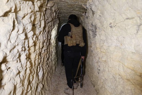 In Aleppo, Syria on January 10, 2026, members of the Syrian Army inspect underground tunnels