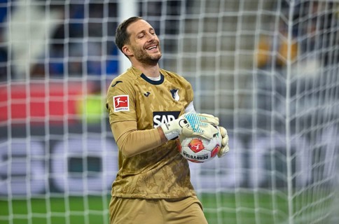 Goalkeeper Oliver Baumann TSG 1899 Hoffenheim (01) with ball smiling PreZero Arena, Sinsheim,