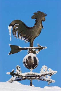 Weather vane with wind rose in snow in winter, hoarfrost, Bavaria, Germany
