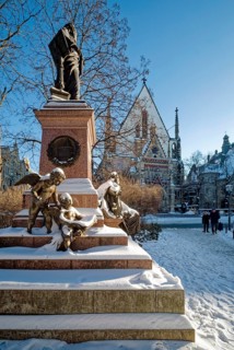 Snowy angel, figure at the Felix Mendessohn Bartholdy monument in winter with snow, Leipzig St.