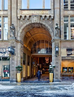 Grimmaische Straße entrance, historic Mädlerpassage shopping arcade in winter with snow, Leipzig,