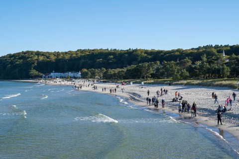 Tourists on the beach in autumn, Baltic Sea, Binz, seaside resort, Rügen island,