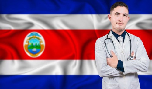 Portrait of medical professional on Costa Rica flag background. Costa Rican national health system