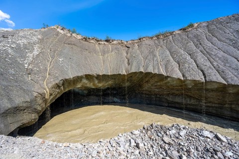 Meltwater at a glacier cave, underground glacier stream, Castner Glacier, Delta Range, Alaska