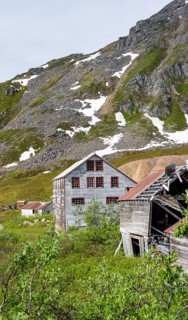 Building of the former Gold Mine Independence Mine in mountainous landscape, Independence Mine