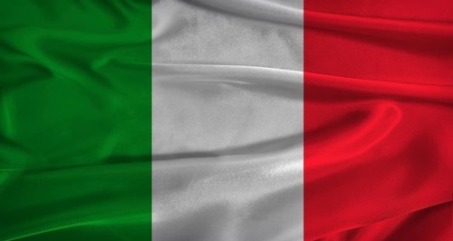 Flag of Italy with fabric textured background. Close up of National flag of Italy with realistic