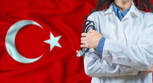 Healthcare professional with Turkey flag background. Professional doctor holding stethoscope on