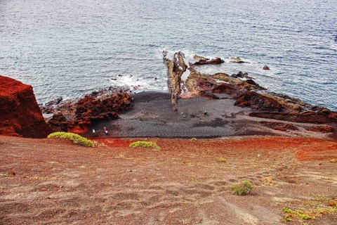 Panoramic view of the rugged coastline with red rocks and calm sea, Chargo Verde El Golfo Lanzarote