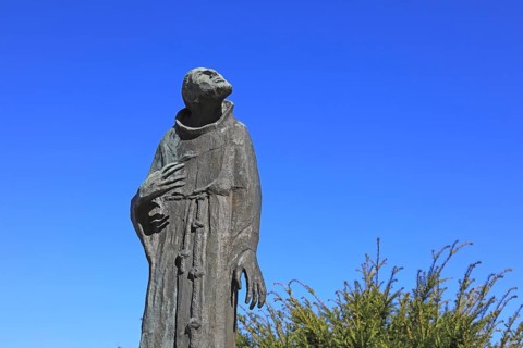 Statue of Francis of Assisi at the pilgrimage church Basilica Vierzehnheiligen near Bad