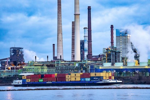 Shipping traffic on the Rhine near Duisburg-Bruckhausen, industrial setting of the ThyssenKrupp