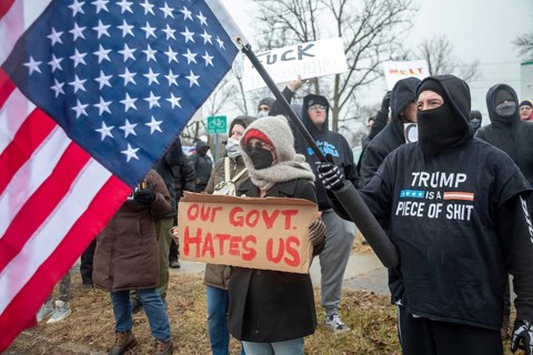 Detroit, Michigan USA - 13 January 2026 - Hundreds of protesters rallied in the rain outside the