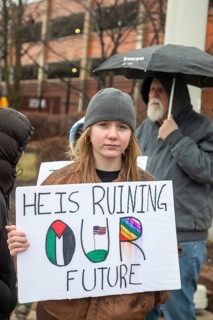 Detroit, Michigan USA - 13 January 2026 - Hundreds of protesters rallied in the rain outside the
