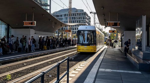 Berlin road traffic with buses, trams and pedestrians at and around the main train station, Berlin,