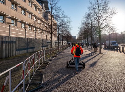 Measurement of the walkway at the Brandenburg Gate near the American Embassy, Berlin, Germany