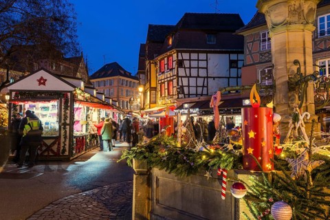 Colourfully illuminated and Christmassy decorated half-timbered houses, old town, blue hour,