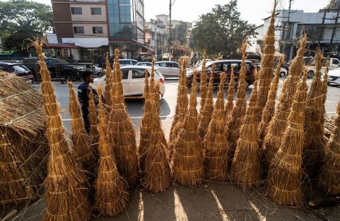 Vendor selling Meji (Bonfire), as part of preparations ahead of the 'Magh Bihu' festival, in